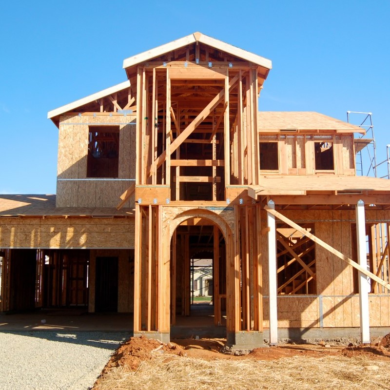 The JSC Custom Homes staff standing outside their main office